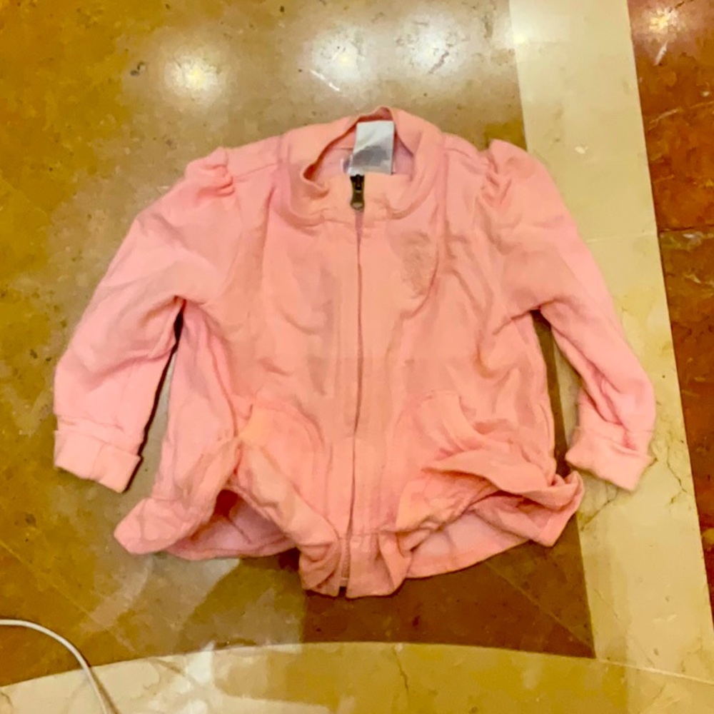 A pink zip up jacket for babies 🎀